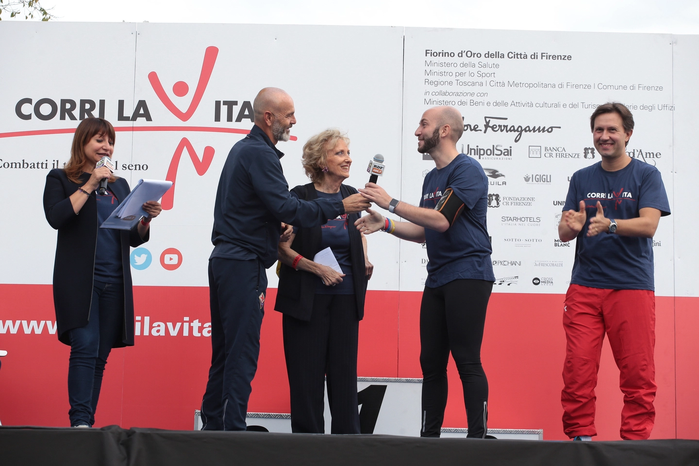 "Corri la vita" con Stefano Pioli e Niccolò Campriani (Cabras/New Press Photo)