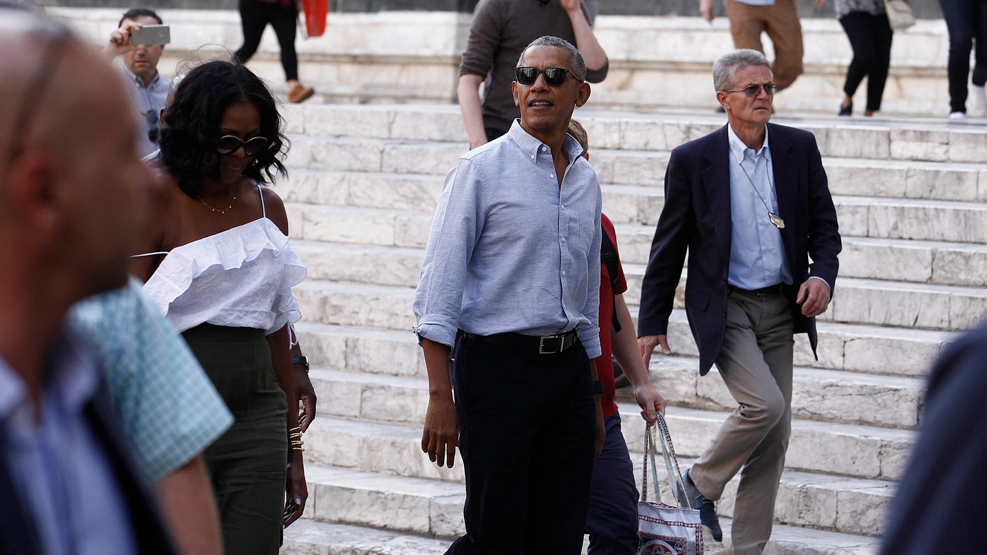 Barack Obama e, a sinistra, la moglie Michelle (Foto Dipietro)