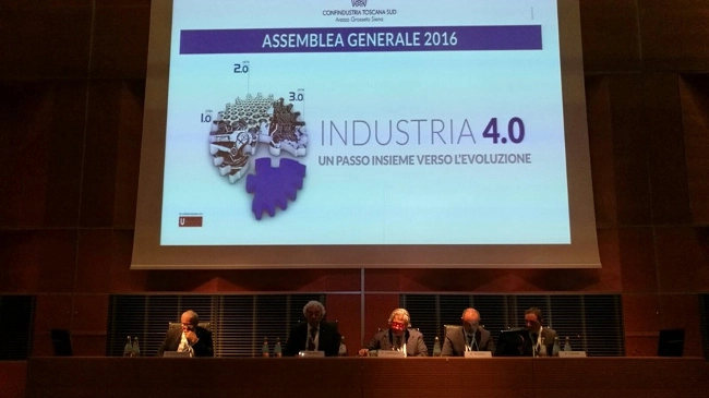 Un'assemblea generale di Confindustria Toscana Sud