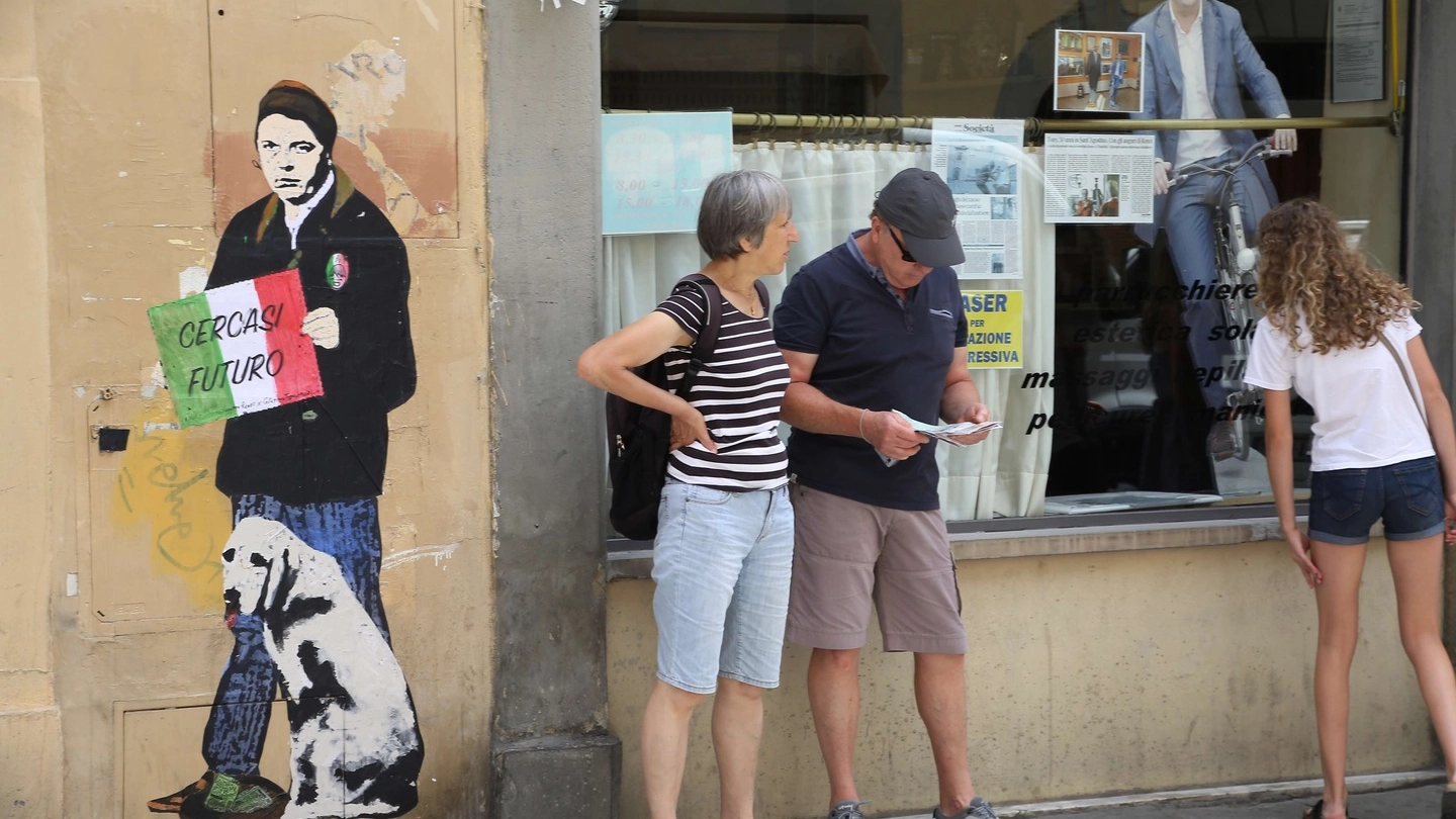 Il murales che ritrae Renzi in via Sant'Agostino (New Press Photo)