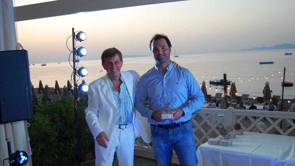 Fernando Damiani, presidente del Golf Club Punta Ala, e il vincitore Niccolò Caucia