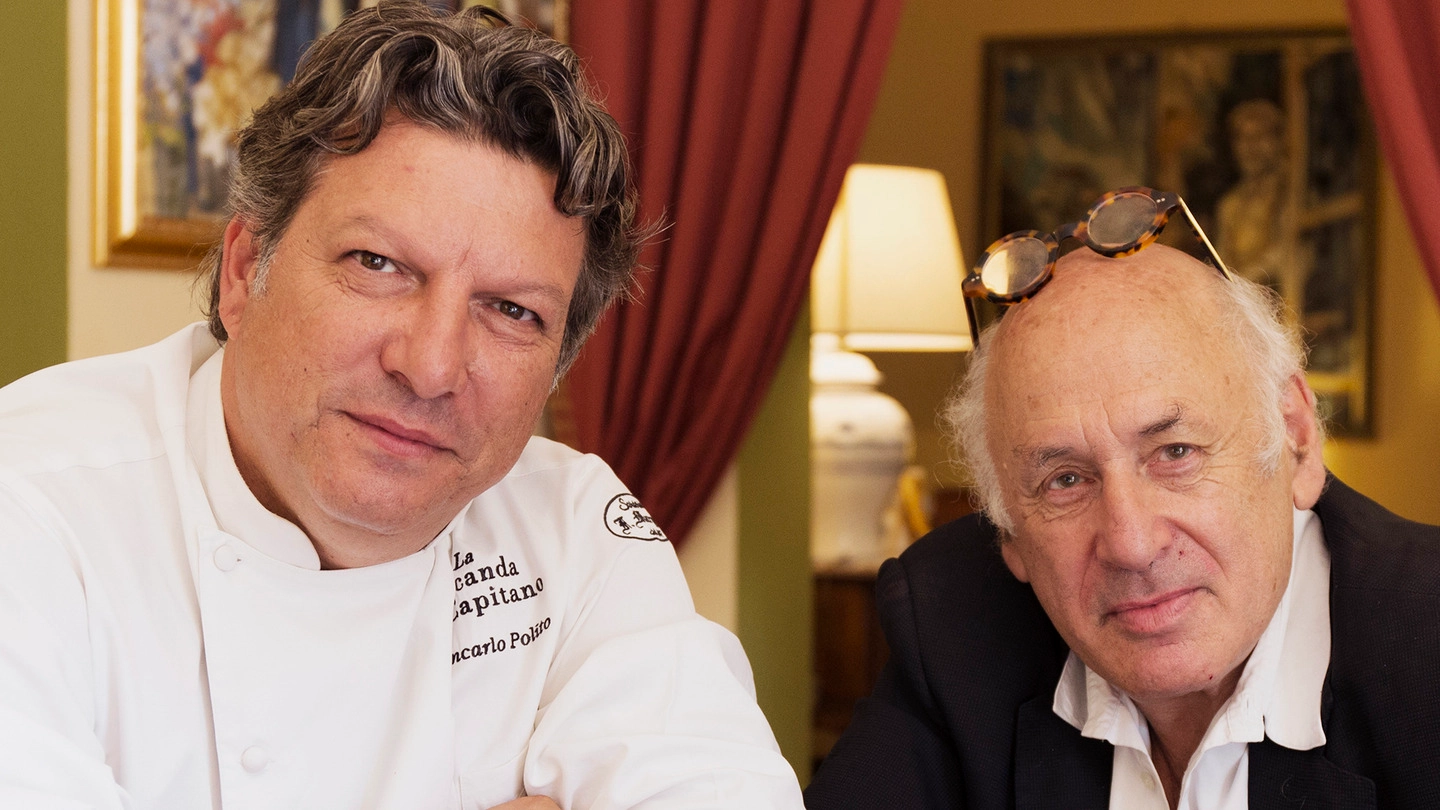 L’artista inglese Michael Nyman (a destra) con lo chef Giancarlo Polito della Locanda del Capitano di Montone 