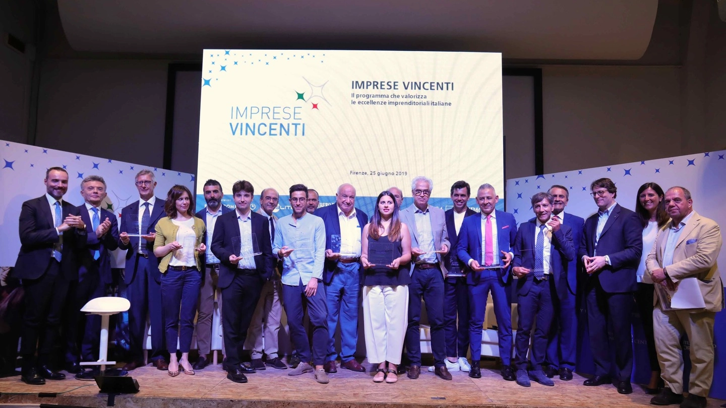 Il gruppo durante l'iniziativa "Imprese Vincenti" (New Press Photo)
