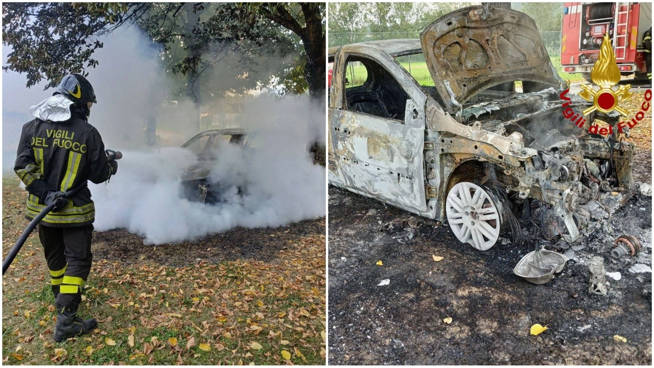 L'intervento dei vigili del fuoco e l'auto distrutta L'intervento dei vigili del fuoco e l'auto distrutta