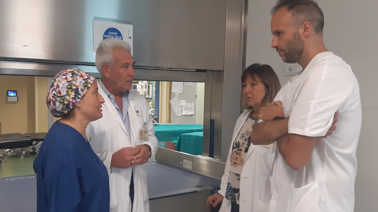 L’ingresso del blocco operatorio. Da sinistra: Fioravanti, Girardi, Di Renzo e Michelagnoli L’ingresso del blocco operatorio. Da sinistra: Fioravanti, Girardi, Di Renzo e Michelagnoli