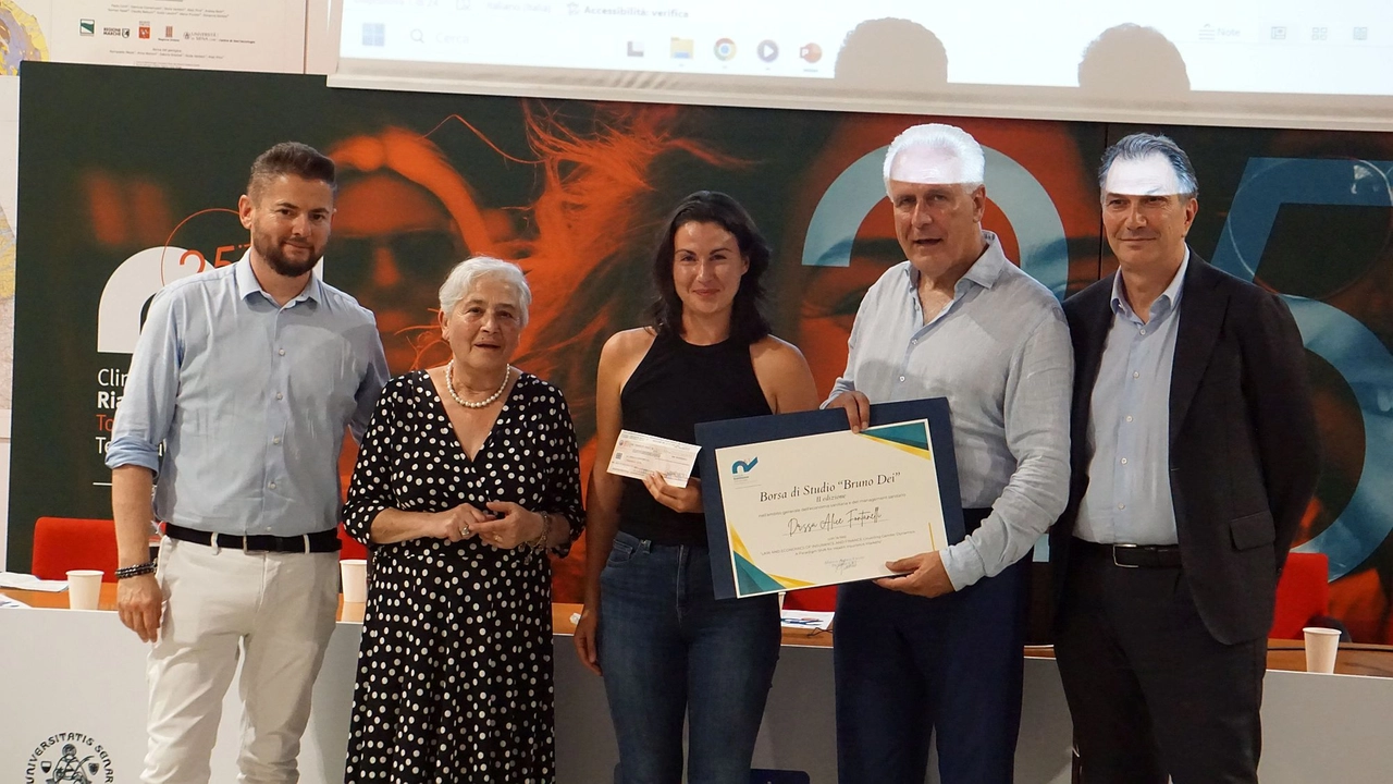 La Fondazione Salvini durante la consegna di una Borsa di Studio La Fondazione Salvini durante la consegna di una Borsa di Studio
