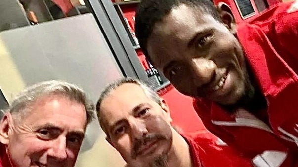 Il sorriso di Fily Keita orgoglioso di far parte della grande famiglia dei volontari della Croce Rossa Italiana