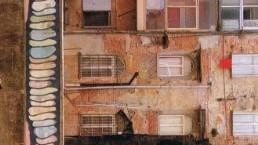 Il retro dei palazzi di via Ghibellina che si affacciano sul Carrione. Gianpaolo Pezzica chiede interventi per il recupero delle facciate storiche e per eliminare parte del degrado. dal centro storico della città
