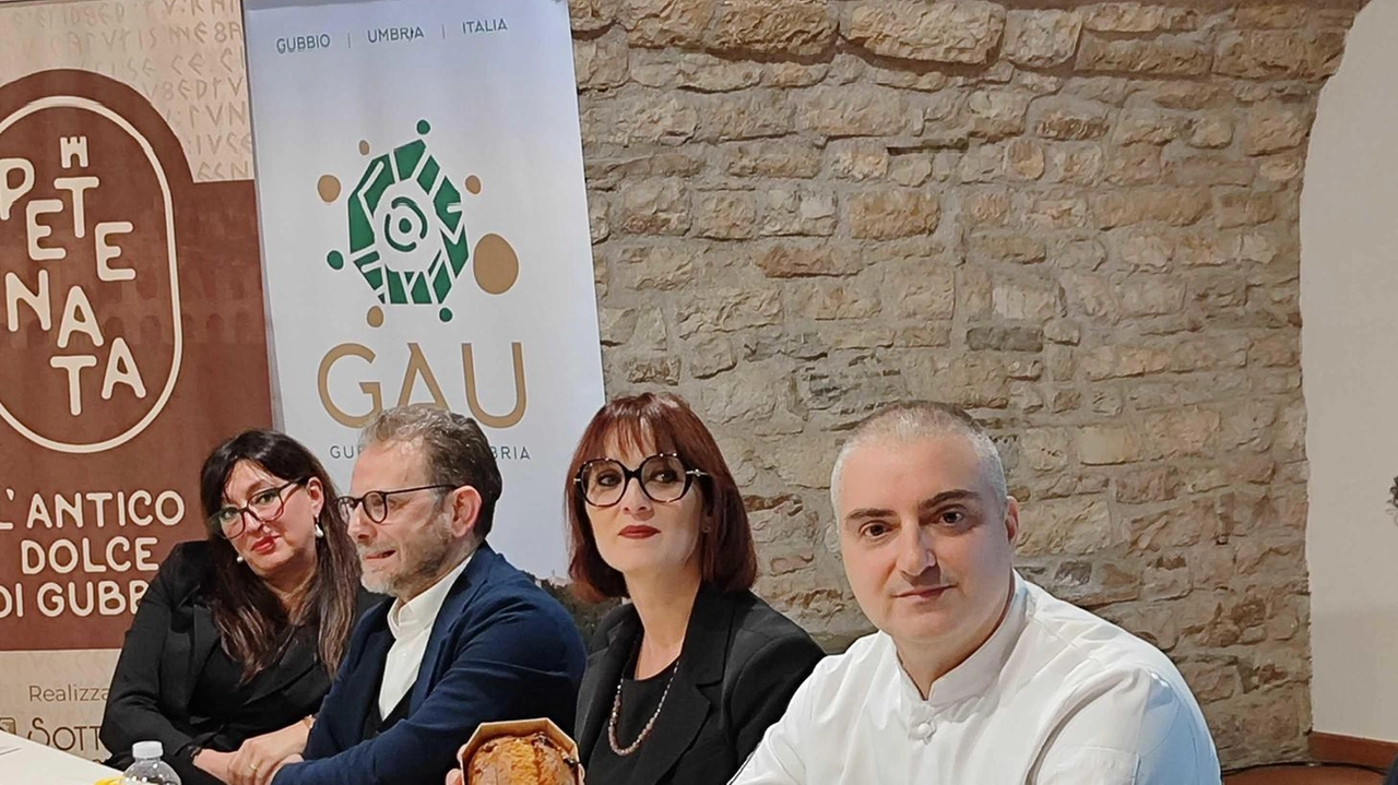 Presentazione del dolce "Petenata" al secondo weekend della Mostra Mercato del Tartufo Bianco di Gubbio. Un connubio tra tradizione e innovazione per valorizzare il territorio umbro. Presentazione del dolce "Petenata" al secondo weekend della Mostra Mercato del Tartufo Bianco di Gubbio. Un connubio tra tradizione e innovazione per valorizzare il territorio umbro.