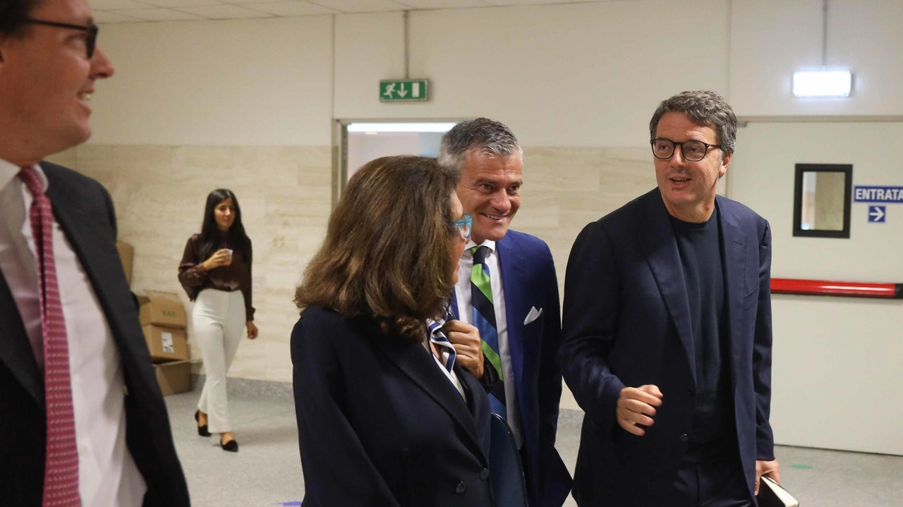 Renzi, con gli avvocati Manes e Severino, durante una delle udienze a Firenze
