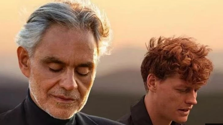 Andrea Bocelli e Jannik Sinner, la copertina del brano "Polvere e Gloria" annunciato sui social Andrea Bocelli e Jannik Sinner, la copertina del brano "Polvere e Gloria" annunciato sui social