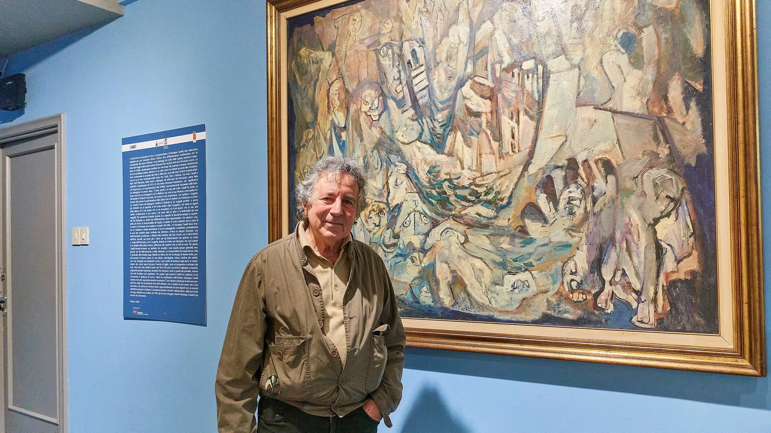 Francesco Vaccarone e alle sue spalle un quadro del suo maestro Giuseppe Caselli