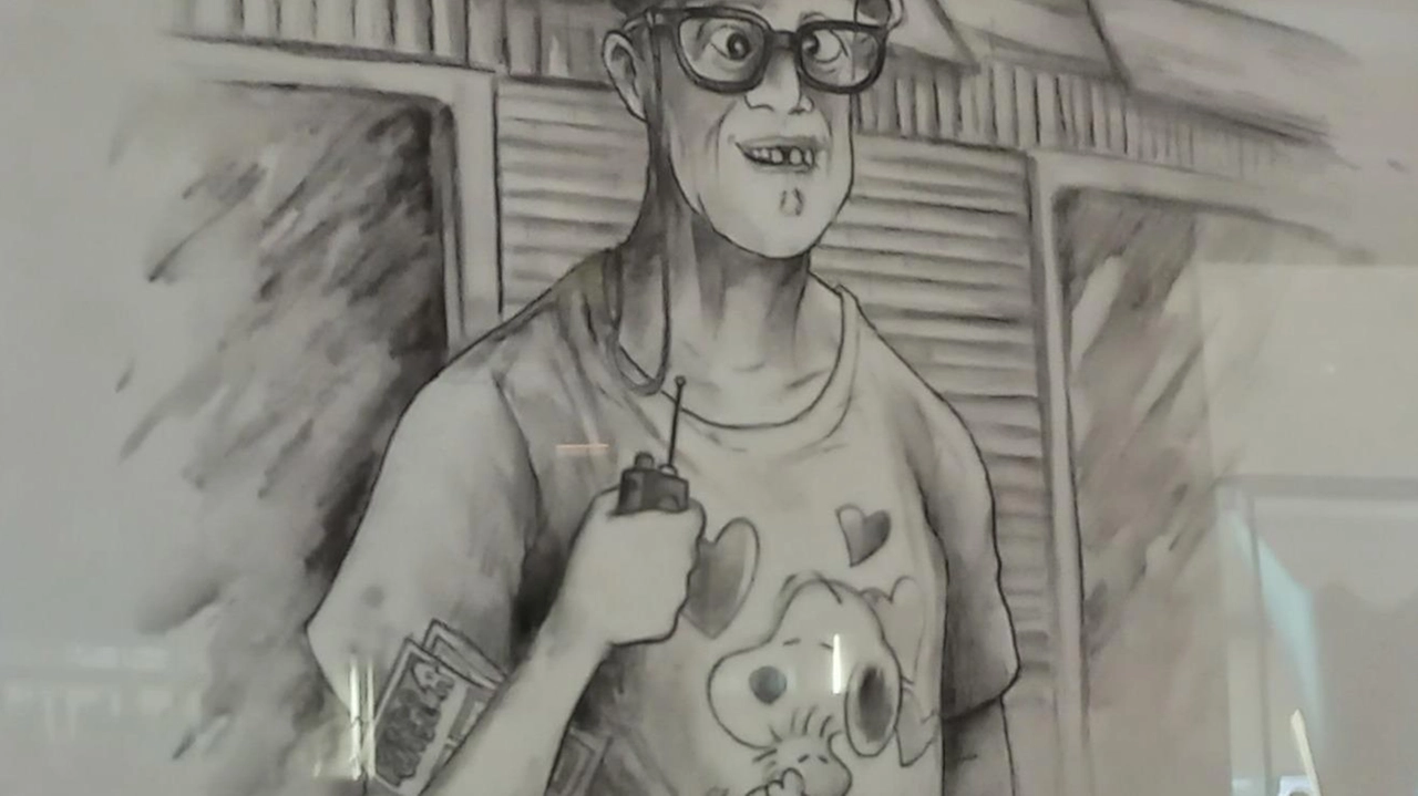 A Pietrasanta un omaggio a Giovanni Verona, figura amata e mancante. Il disegno di Luca Baldi al bar "Michelangelo" ricorda il vigile con affetto e poesia. A Pietrasanta un omaggio a Giovanni Verona, figura amata e mancante. Il disegno di Luca Baldi al bar "Michelangelo" ricorda il vigile con affetto e poesia.