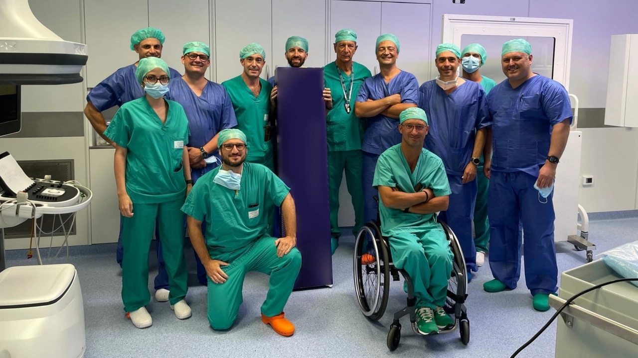 Il team di specialisti che ha condotto l'intervento Il team di specialisti che ha condotto l'intervento