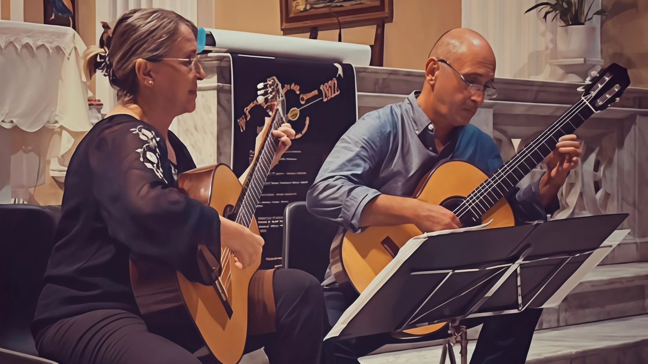 I chitarristi massesi Roberto Masini e Simona Costantino stasera a Palazzo Ducale. Apre il concerto il giovanissimo chitarrista Cesare Augusto Panconi I chitarristi massesi Roberto Masini e Simona Costantino stasera a Palazzo Ducale. Apre il concerto il giovanissimo chitarrista Cesare Augusto Panconi