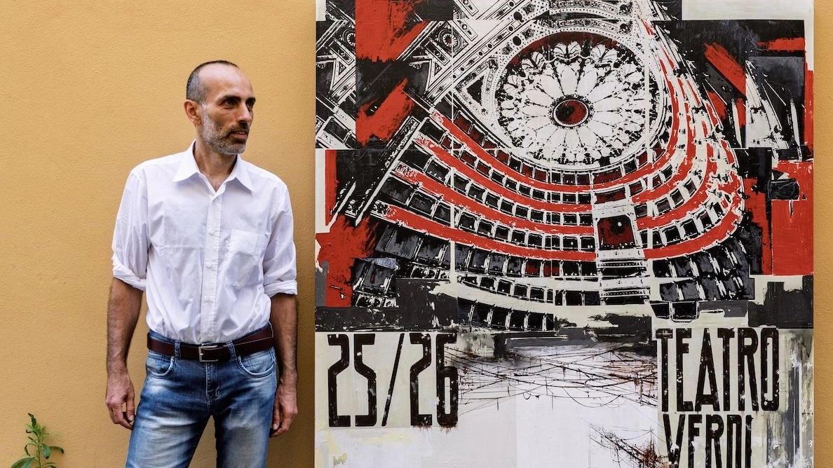 L’artista pisano Francesco Barbieri con il manifesto del Teatro Verdi di Pisa L’artista pisano Francesco Barbieri con il manifesto del Teatro Verdi di Pisa