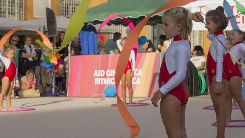 L'ASD Ginnastica Ritmica Lucca presenta "Ritmica in città 2024" al Settembre Lucchese nel centro storico di Lucca. Esibizioni delle giovani ginnaste e possibilità per le bambine di provare gli attrezzi tipici della ritmica. L'ASD Ginnastica Ritmica Lucca presenta "Ritmica in città 2024" al Settembre Lucchese nel centro storico di Lucca. Esibizioni delle giovani ginnaste e possibilità per le bambine di provare gli attrezzi tipici della ritmica.