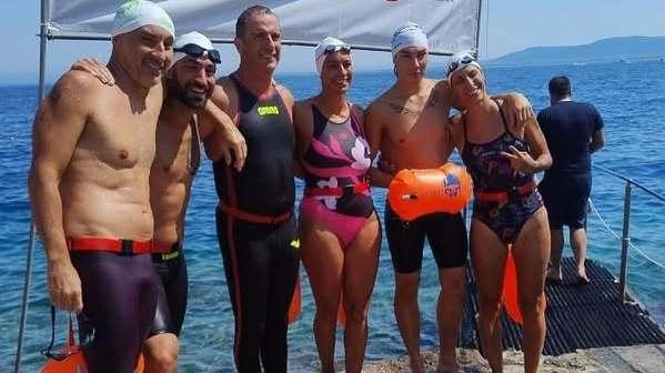 L’arrivo della nuotata “Da Porto a Porto ATTorno all’Argentario“ di ieri mattina