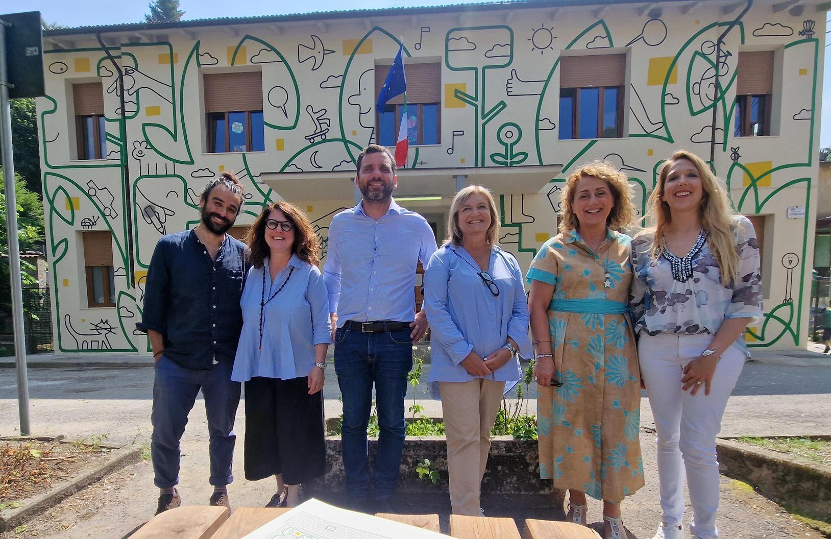 un murale per la scuola calugi a la margherita