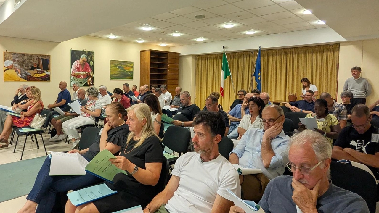 Un’immagine della recente assemblea di Confartigianato; a destra la presidente Michela Fucile e il direttore Roberto Favilla