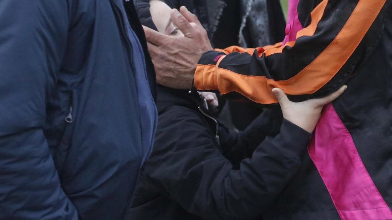 Tempesta con il figlio Alberto, papà Massimo e la moglie Camilla Marzi