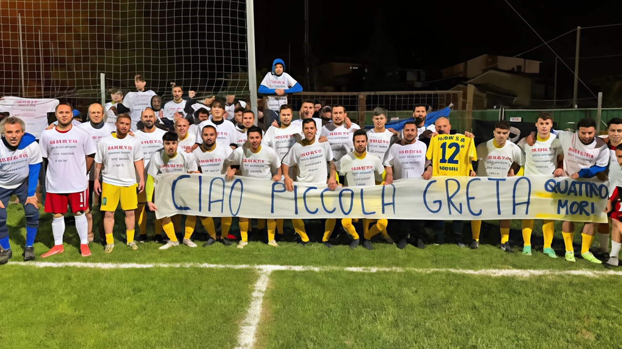 La squadra del 4 Mori con le magliette in ricordo della piccola Greta La squadra del 4 Mori con le magliette in ricordo della piccola Greta
