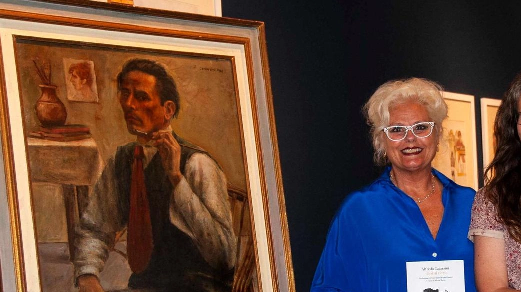 Elena Martinelli davanti a un quadro del pittore viareggio, Alfredo Catarsini che era suo nonno materno Elena Martinelli davanti a un quadro del pittore viareggio, Alfredo Catarsini che era suo nonno materno
