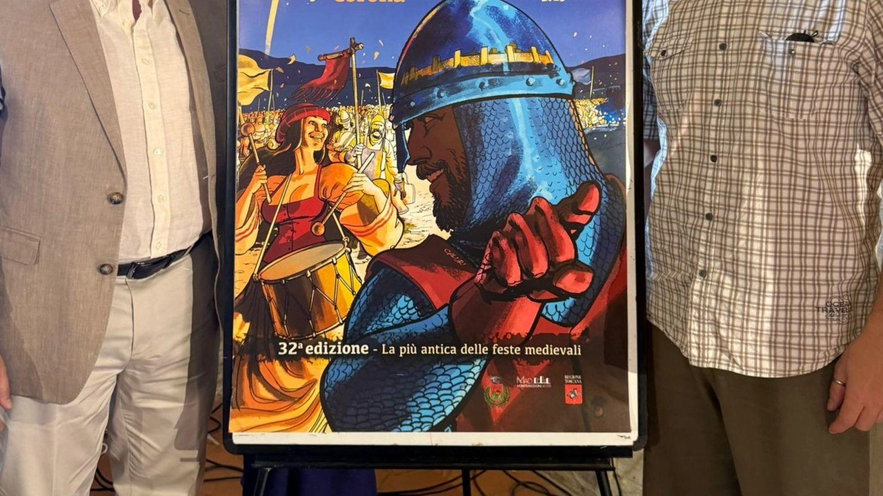 Il sindaco di Monteriggioni Andrea Frosini con l’illustratore Daniele Caluri e il suo manifesto per la Festa Medievale che tornerà a inizio luglio, appuntamento tradizionale giunto all’edizione numero 32 Il sindaco di Monteriggioni Andrea Frosini con l’illustratore Daniele Caluri e il suo manifesto per la Festa Medievale che tornerà a inizio luglio, appuntamento tradizionale giunto all’edizione numero 32