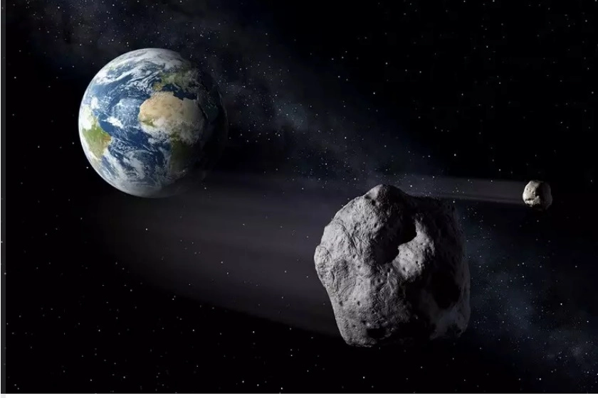 Rappresentazione artistica di due asteroidi vicini alla Terra (fonte: ESA - P.Carril)