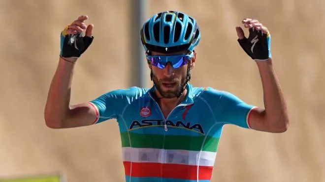 Italian Vincenzo Nibali of Astana Pro Team celebrates on the finish line as he wins the fourth stage of the seventh cycling Tour of Oman between Muscat and Jebel Akhdhar (Green Mountain) on February 19, 2016.
Vincenzo Nibali took the red jersey for the overall individual ranking of the tour.  / AFP / Eric Feferberg