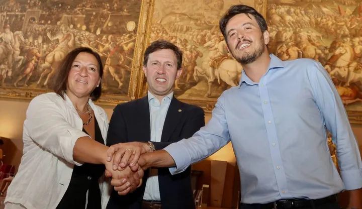 Il sindaco Dario Nardella insieme ai due nuovi assessori Federica. Giuliani e Andrea. Giorgio