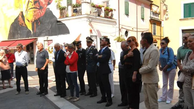Una cerimonia del VII Luglio e in alto Almarella Binelli, presidente Anpi