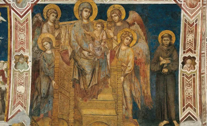 La “Madonna in trono col bambino, angeli e San Francesco“ di Cimabue