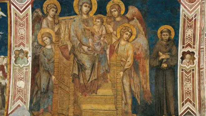 La “Madonna in trono col bambino, angeli e San Francesco“ di Cimabue