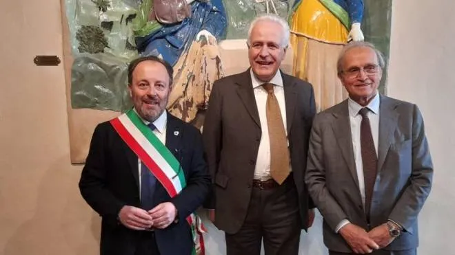 Il presidente Eugenio Giani fra Claudio Marcelli e Albano Bragagni