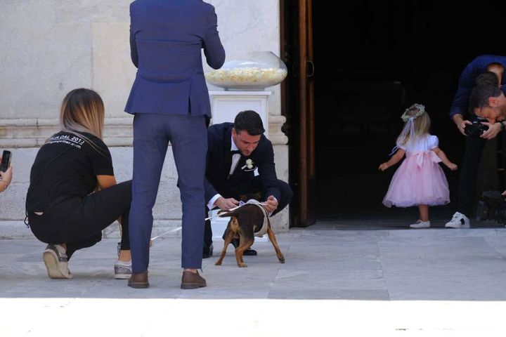 Damiano Carrara e il cane della coppia, Paco