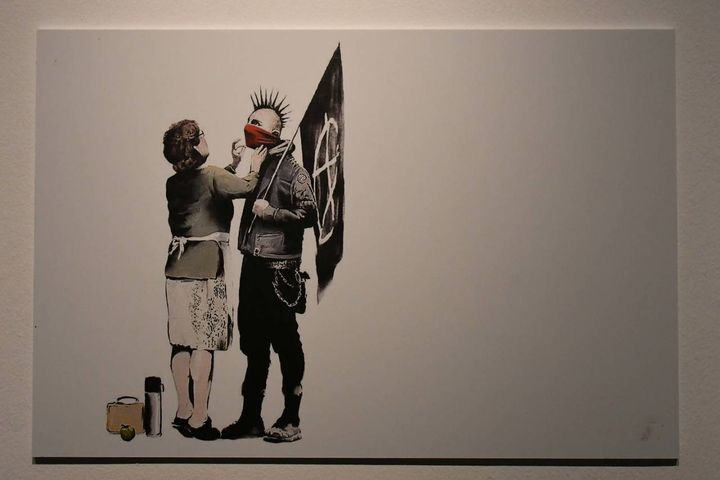 Le opere di Banksy esposte a Livorno (Foto Novi)
